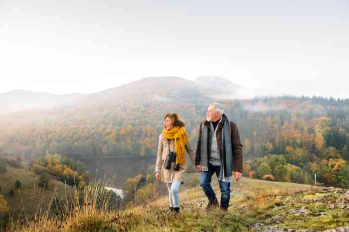 Senior couple on a walk in an autumn nature