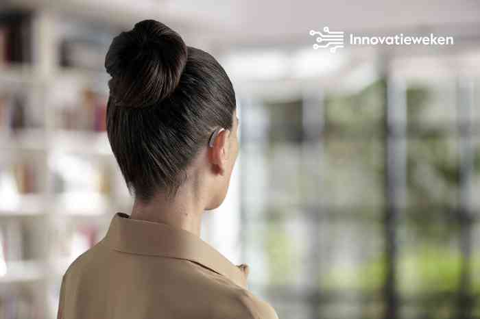 a woman wearing the hearing aid