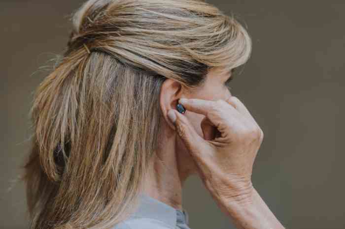a woman wearing the hearing aid