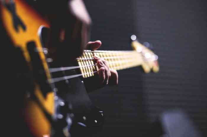 A musician playing the guitar