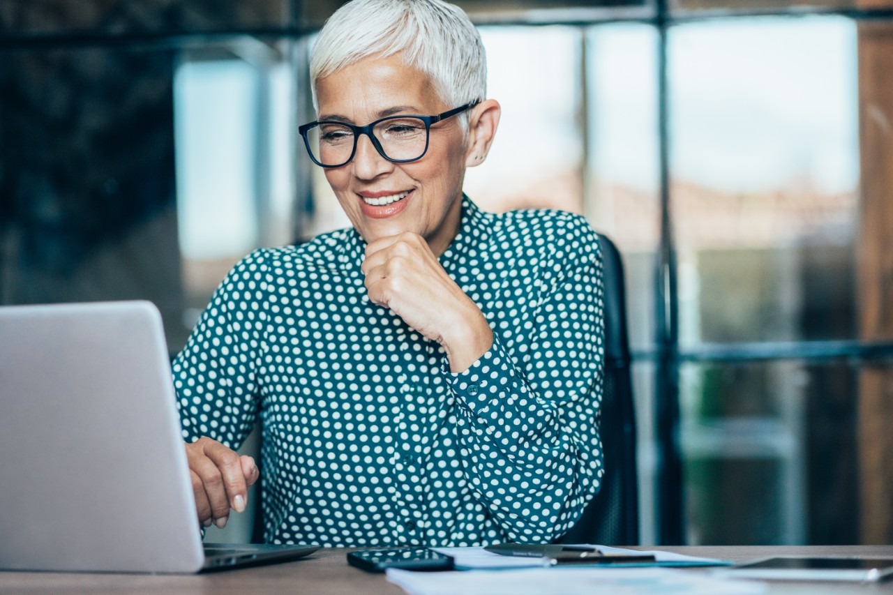 Old woman using a laptop