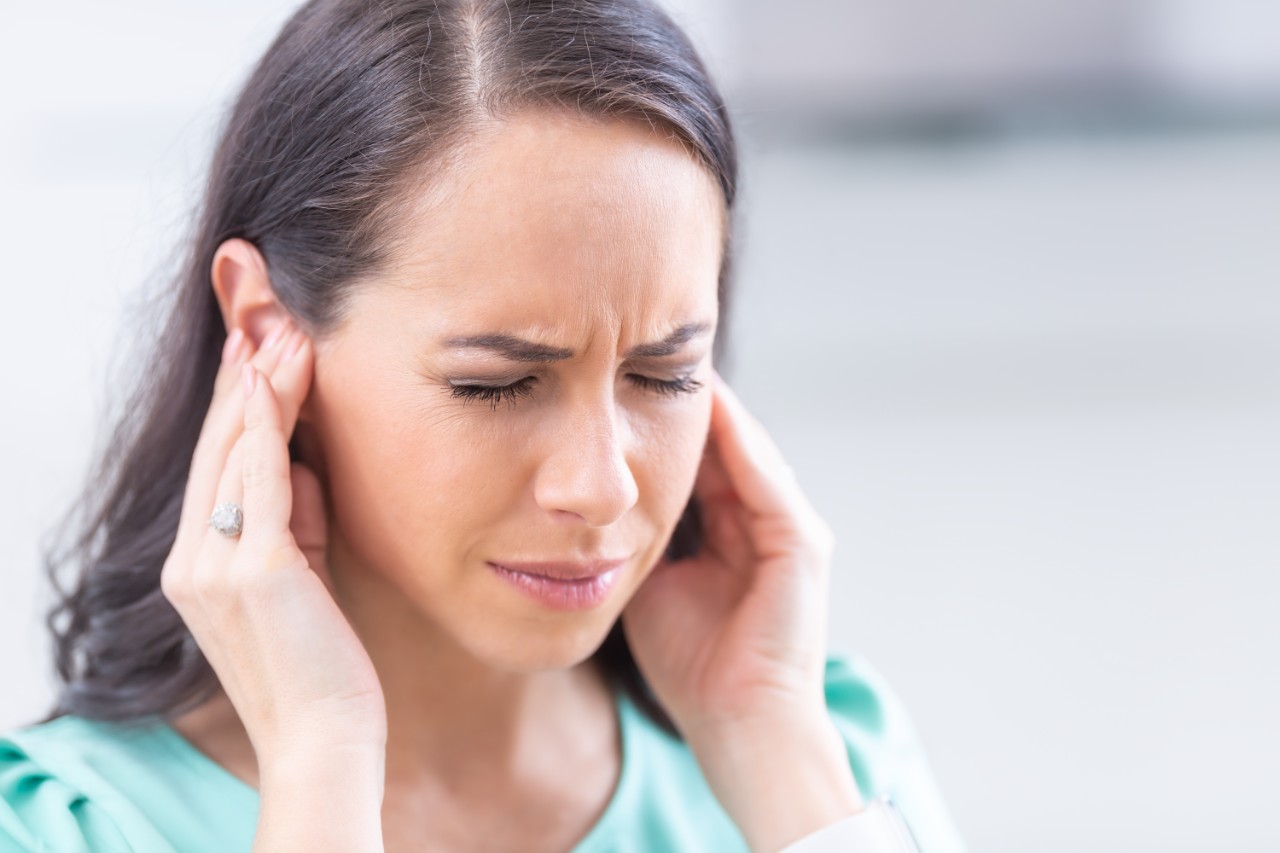 Young Woman Holding Ears Pain 